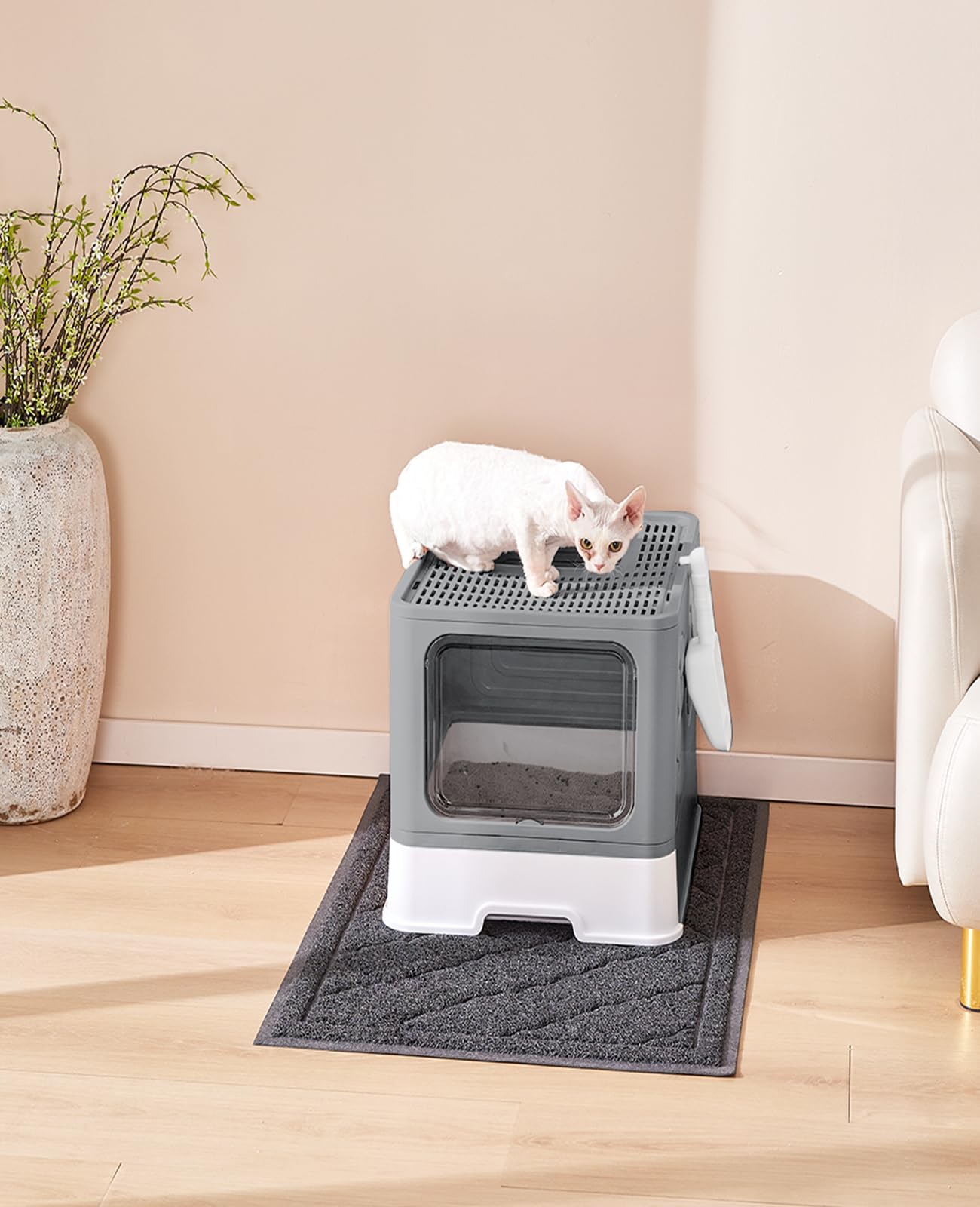Medario cat litter box easy-clean demonstrates simple maintenance with drawer and scoop.