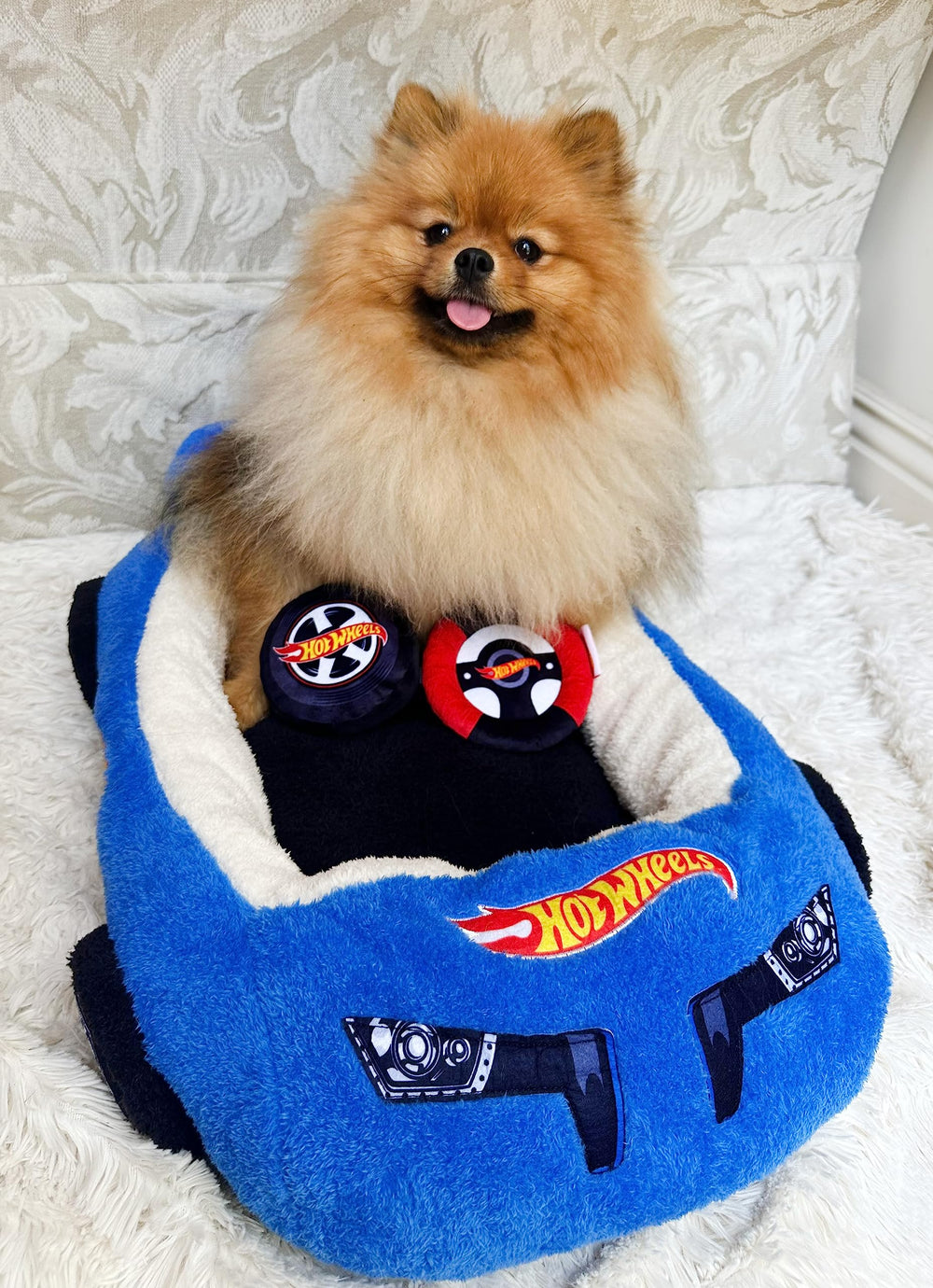 Megatoys Hot Wheels pet bed front view with blue car shape—cozy nap spot.