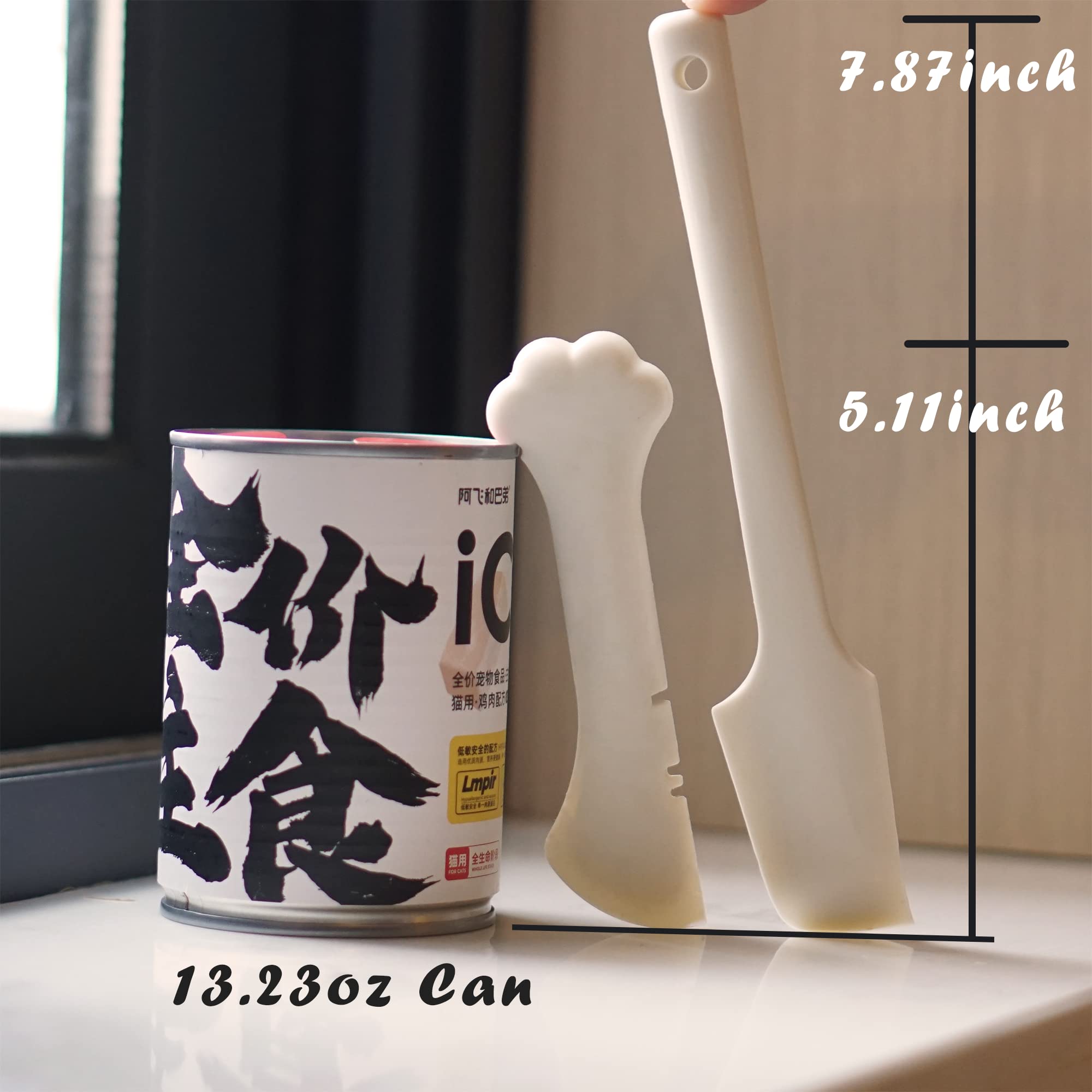 Meow&Woof mini spatula for canned pet food showing flexible silicone scraping.