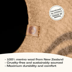 Meowfia Cat Cave beige closeup reveals soft natural wool texture.