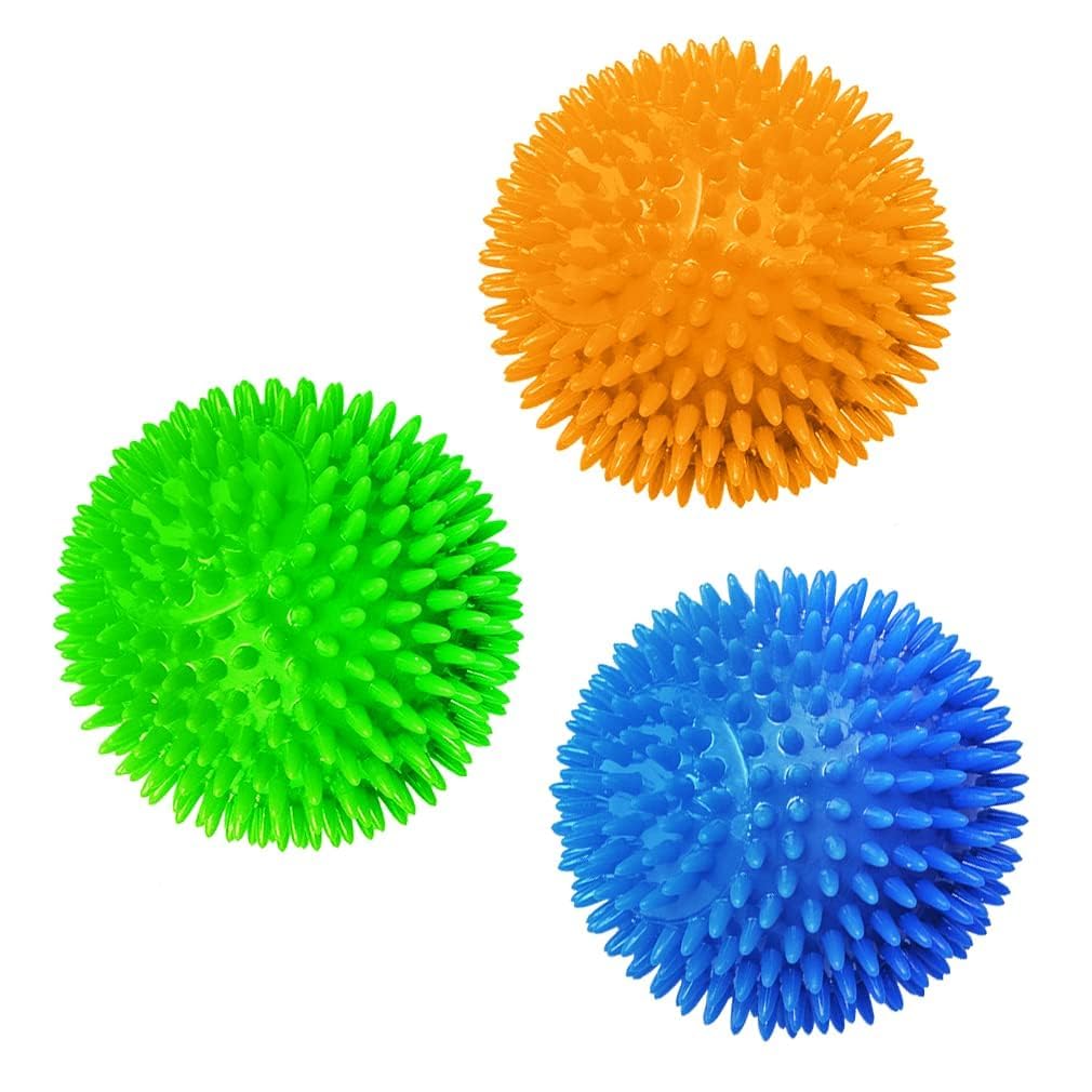 Meric CoCoo blue ball with spikes promotes gum massage during playtime.
