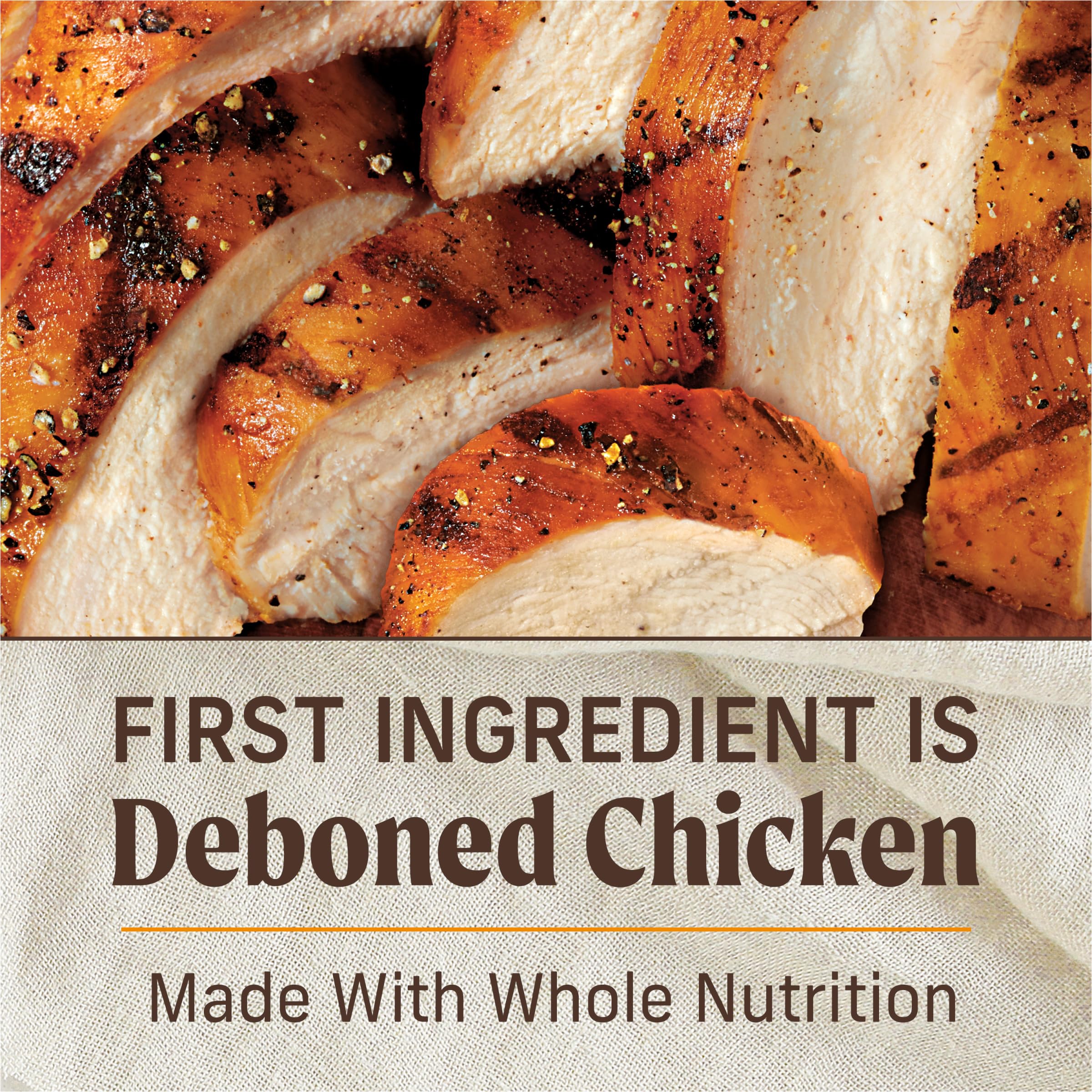 Merrick Puppy Plate topper image shows gravy-rich chicken over dry kibble.