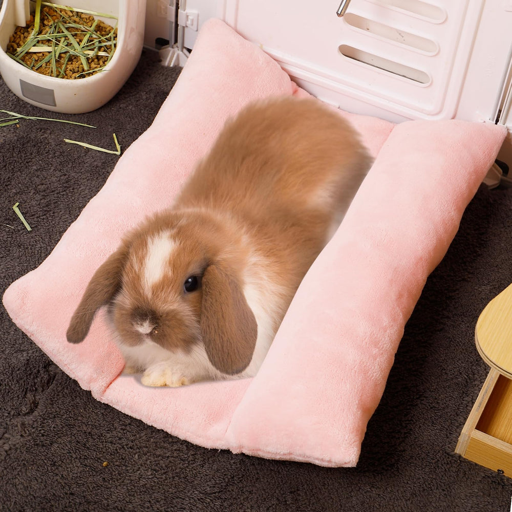 MEWTOGO bunny bed placed in cage creates a cozy nesting area.