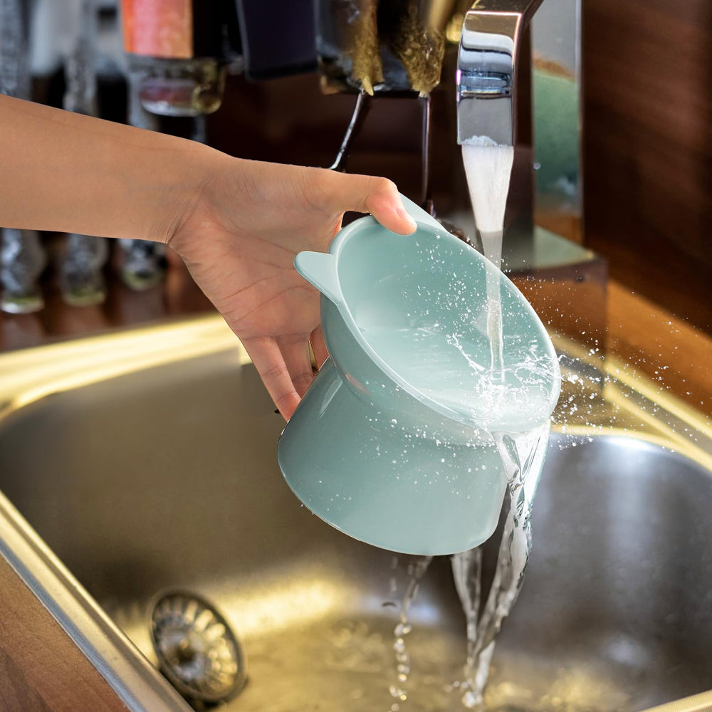 Mezchi stable-base elevated bowls resist tipping during mealtime.