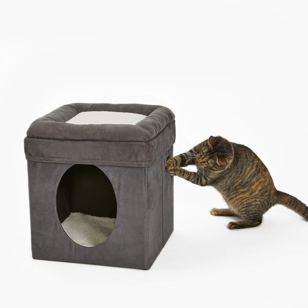 MidWest Homes for Pets Cat Cube den interior with soft faux fur bedding for cozy naps.