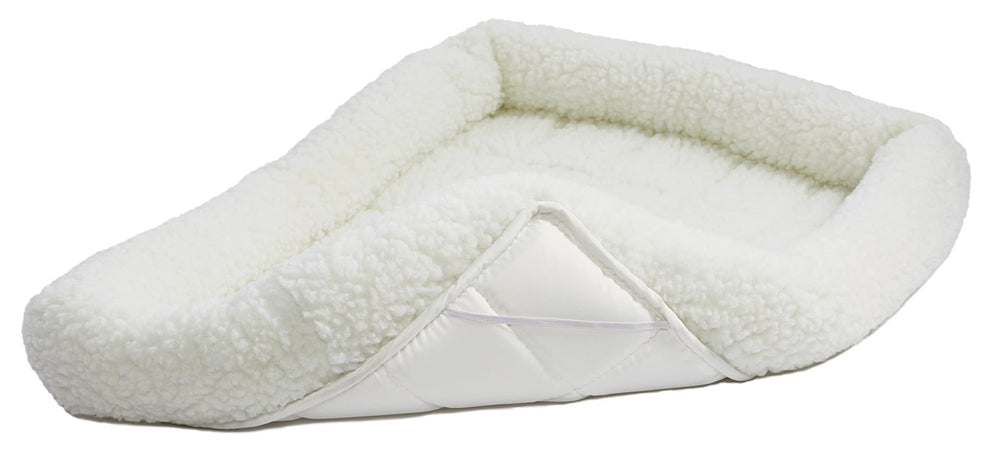 MidWest QuietTime XXS bed secured to crate with elastic straps to prevent shifting.