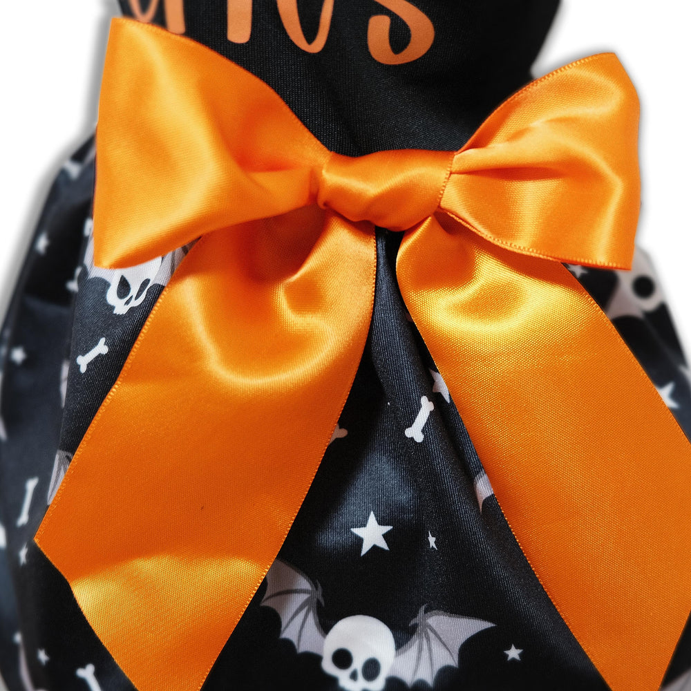 Miiemiu Skull-Bat Dog Skirt flatlay with pumpkins for seasonal styling