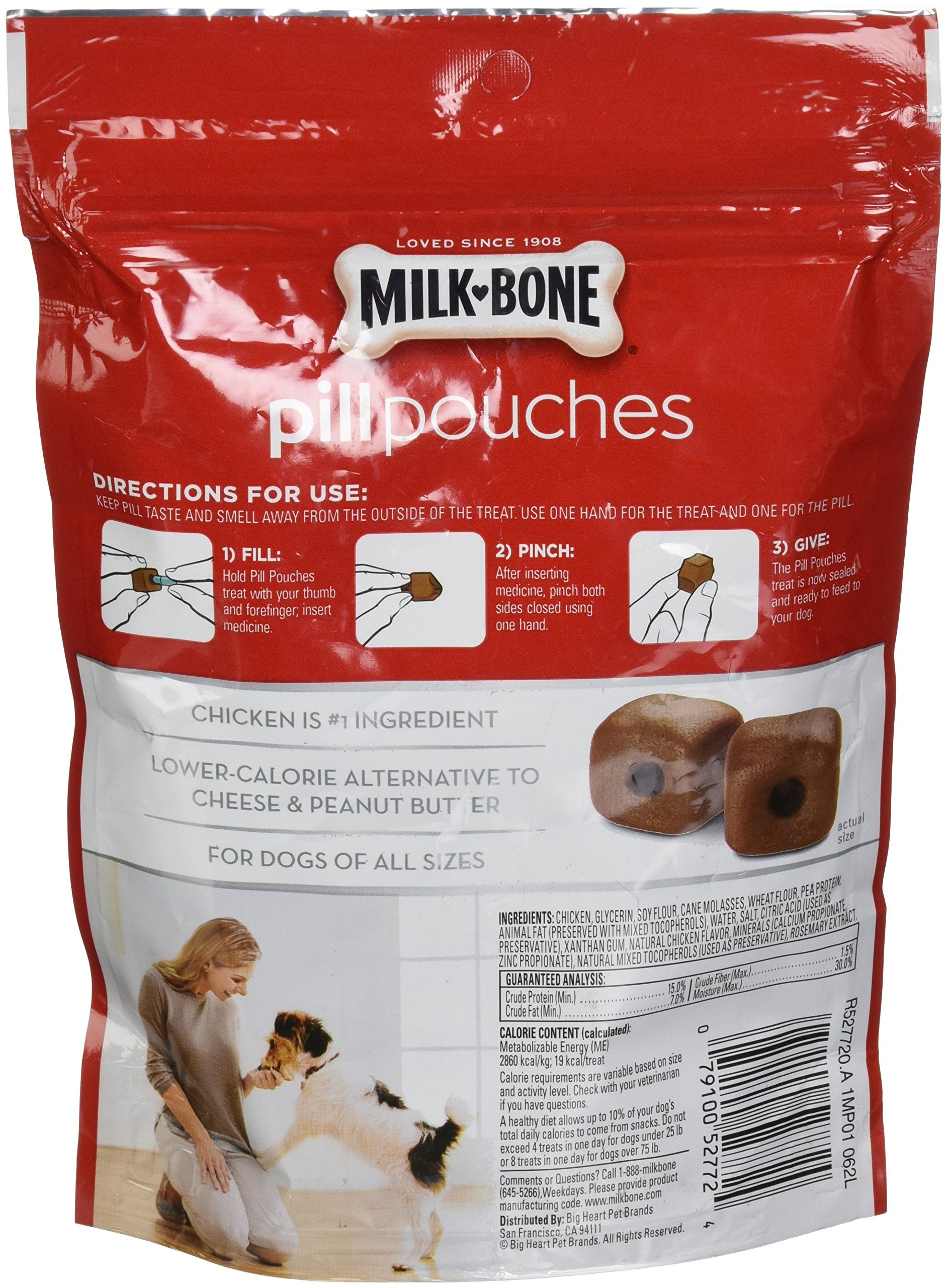Milk-Bone pill pouches being used during mealtime for easy pill hiding.