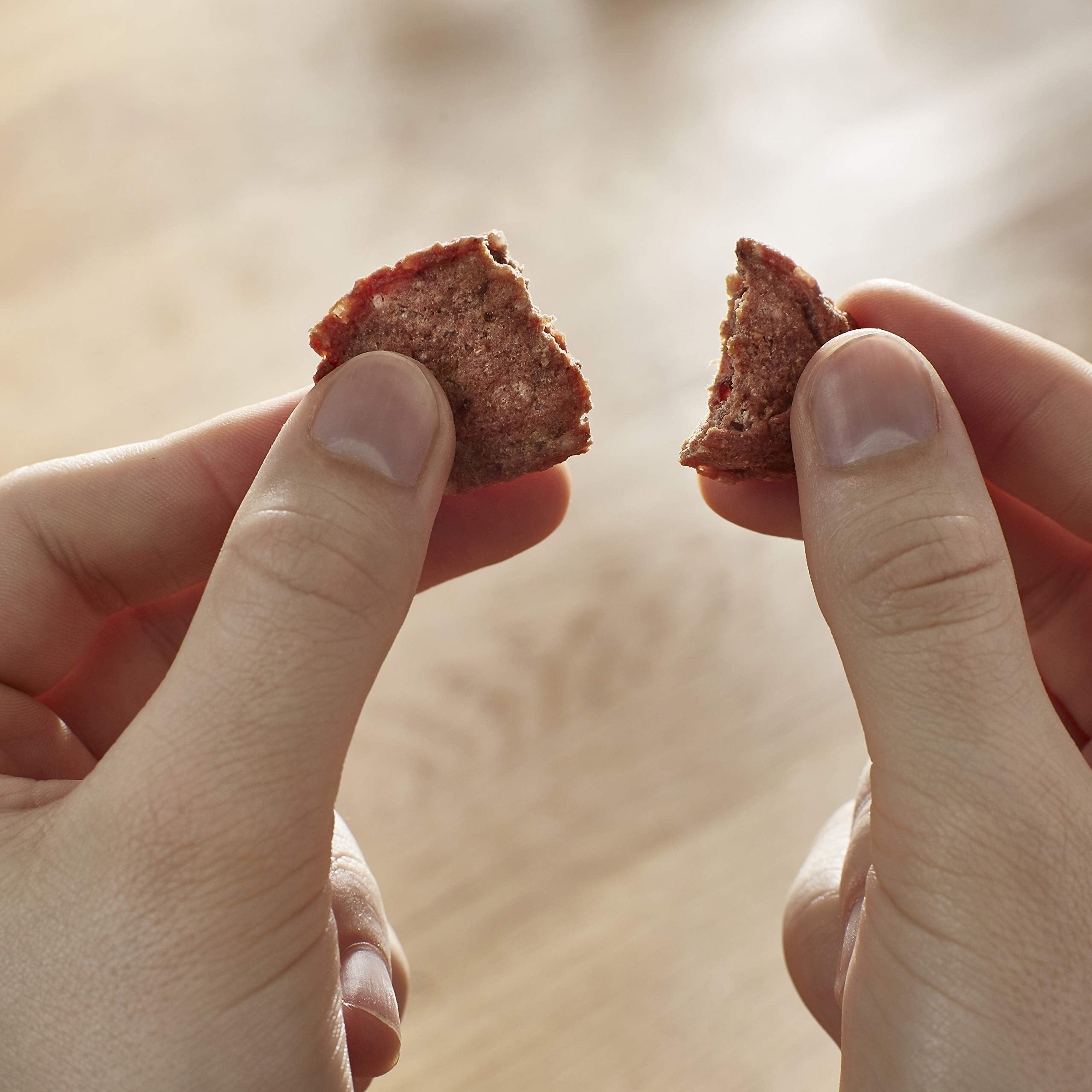 Milo's Kitchen beef sausage slices with rice ingredients close-up showing real beef