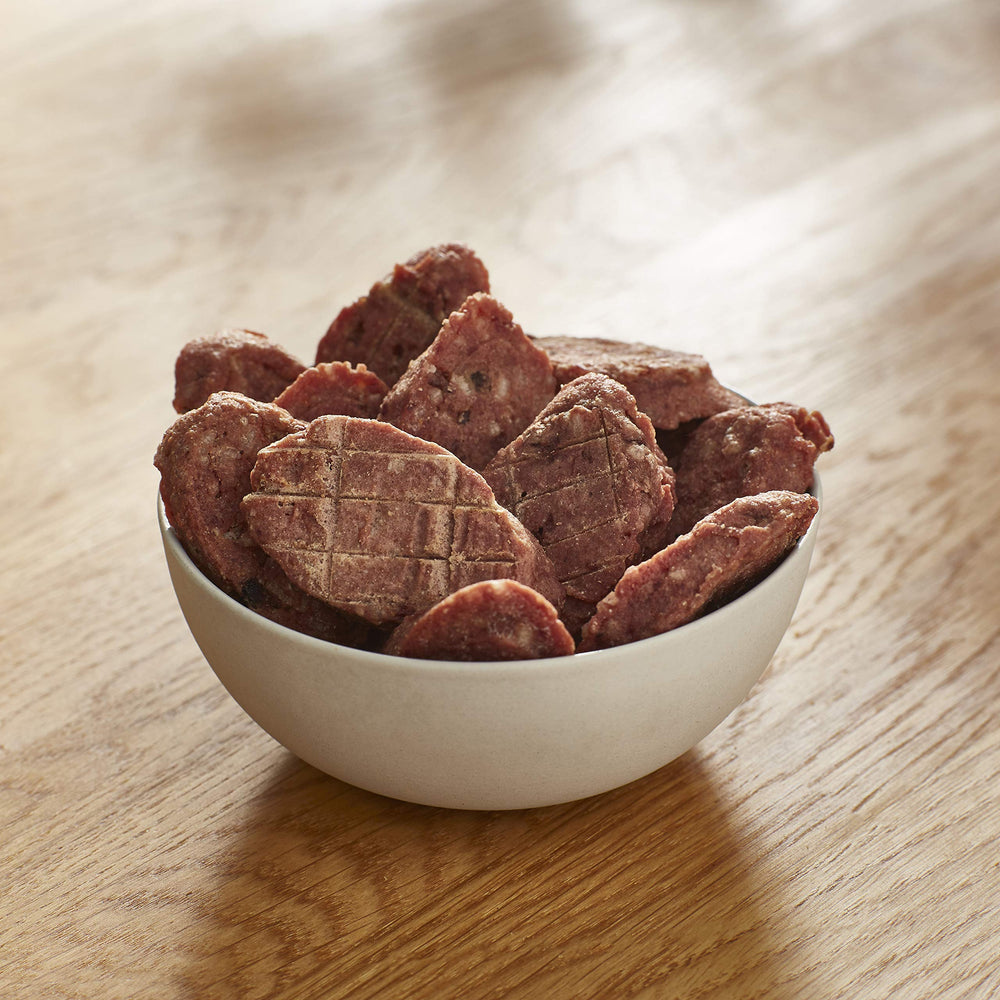Milo's Kitchen beef sausage slices with rice texture close-up shows meaty chew