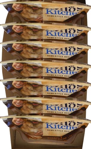 Milo's Kitchen Simply Chicken Jerky pouch in hand implies portion control for dogs.