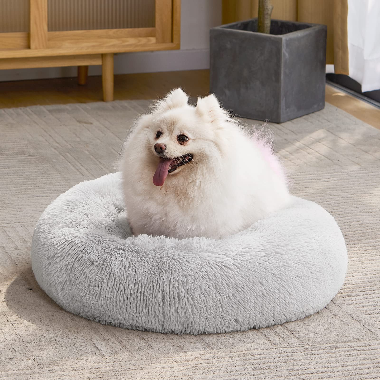 MIXJOY Donut Cuddler grey bed suits modern decor while providing a comfy retreat