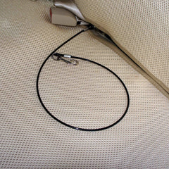 Mogoko safety latch bar attachment demonstrates secure mounting to car seat.