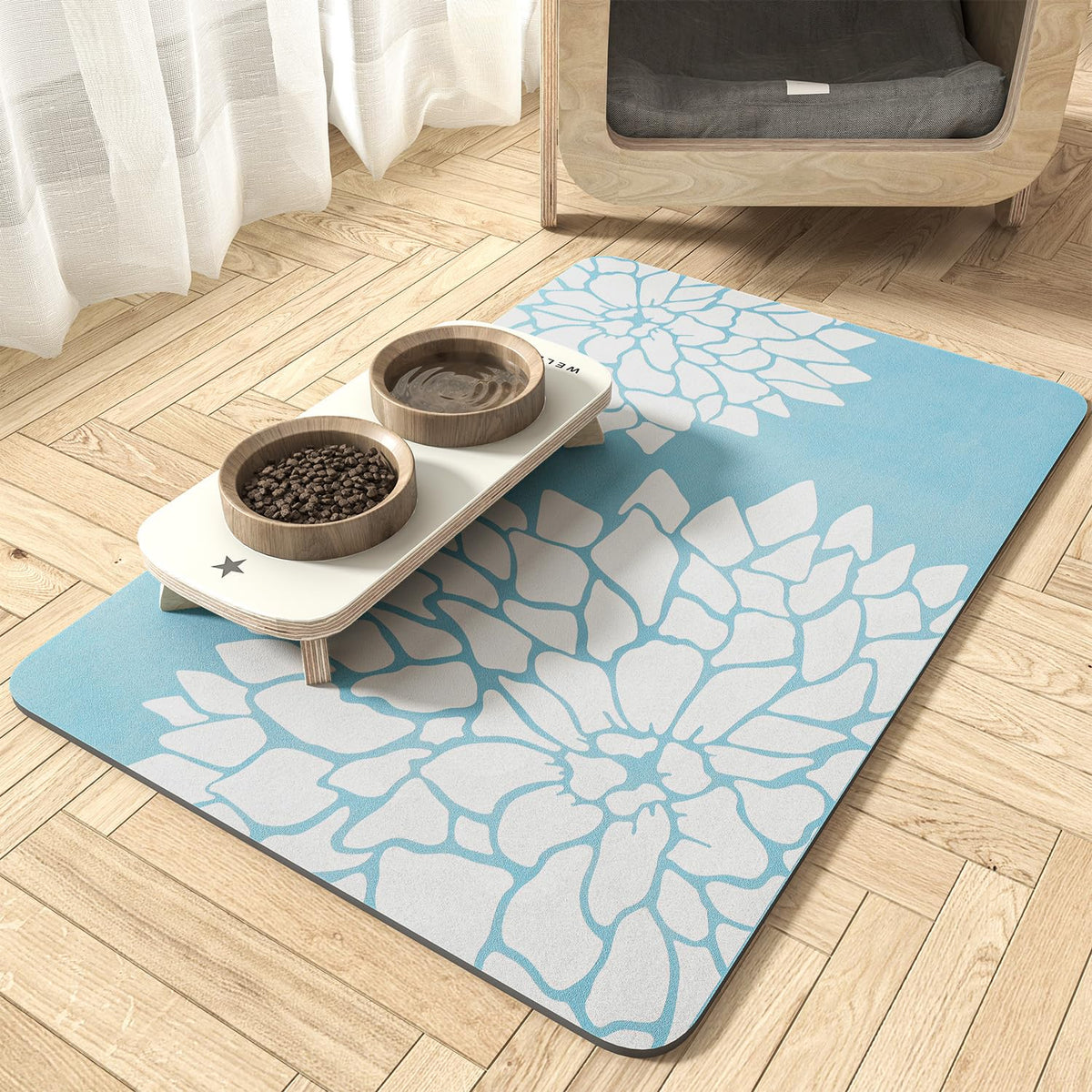 MontVoo pet feeding mat with absorbent floral design captures spills to keep floors dry.