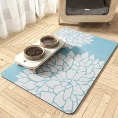 MontVoo pet feeding mat with absorbent floral design captures spills to keep floors dry.
