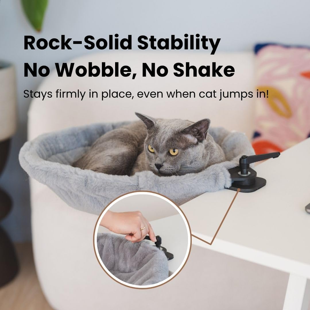 Moose Cozy rotating hammock provides an elevated viewing perch beside your workspace.