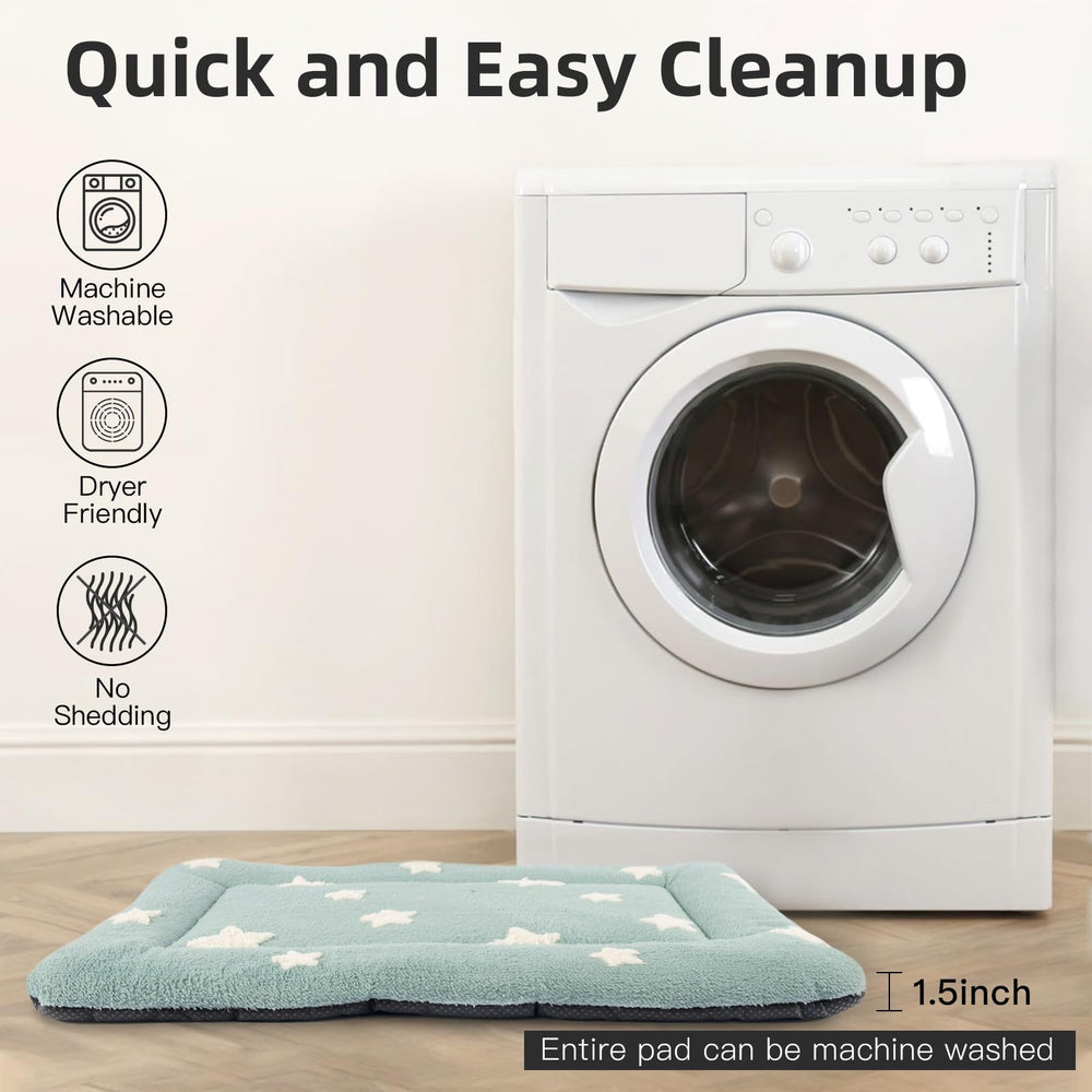 Mora Pets blue crate pad shown inside kennel for easy travel.