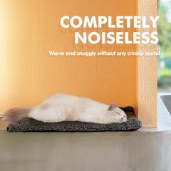 Mora Pets self warming bed carbon-infused cover closeup highlights warmth technology.