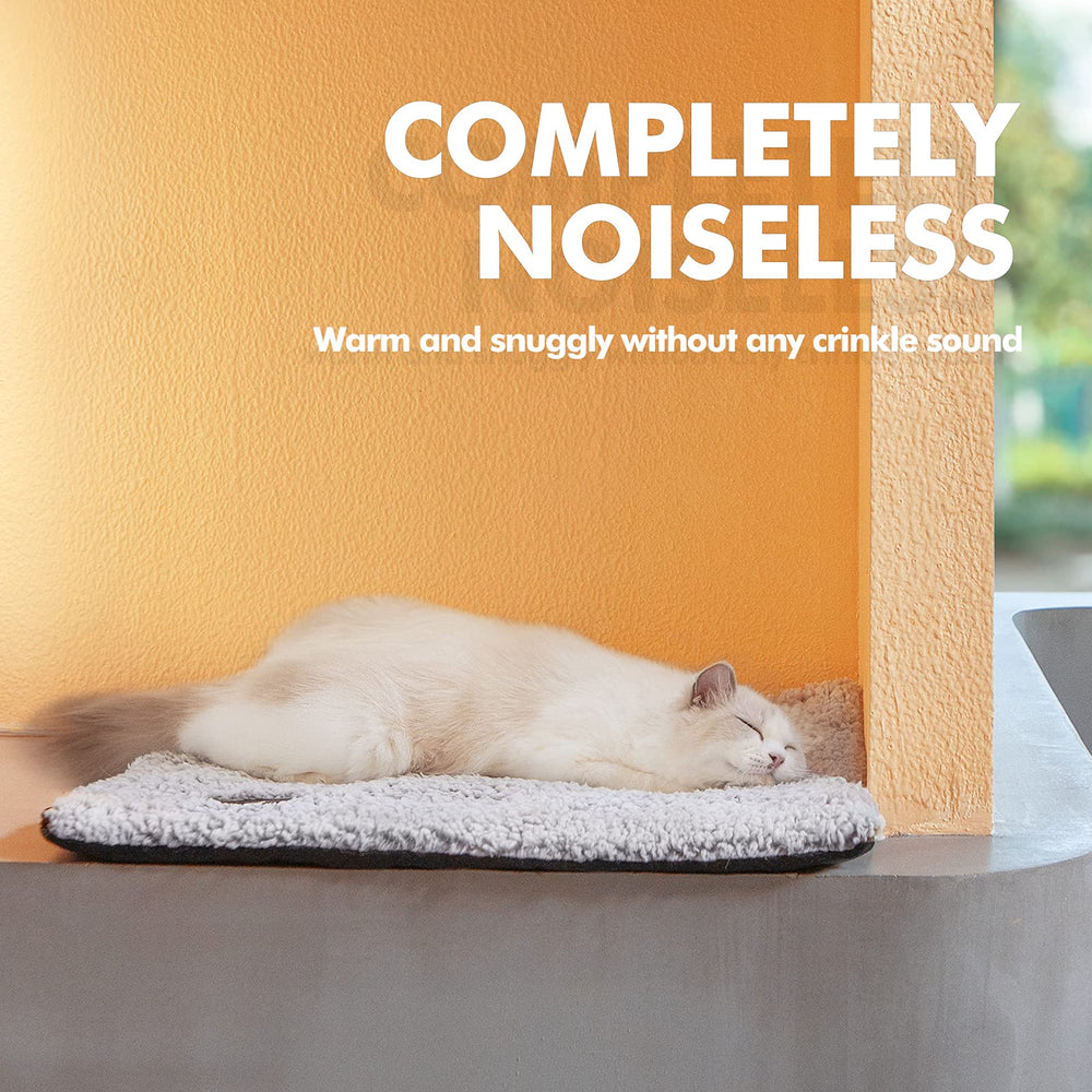 Mora Pets self-warming bed carbon infused cover highlights natural heat reflection for cozy warmth.