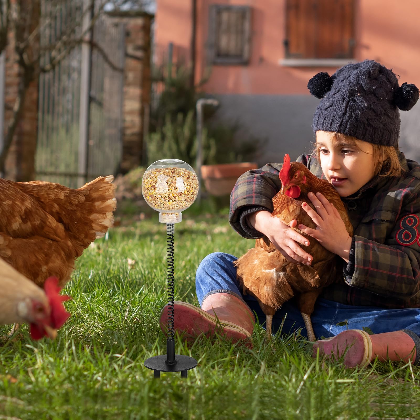 Moyardow Peck Toy spring tower adds gentle movement as chickens peck