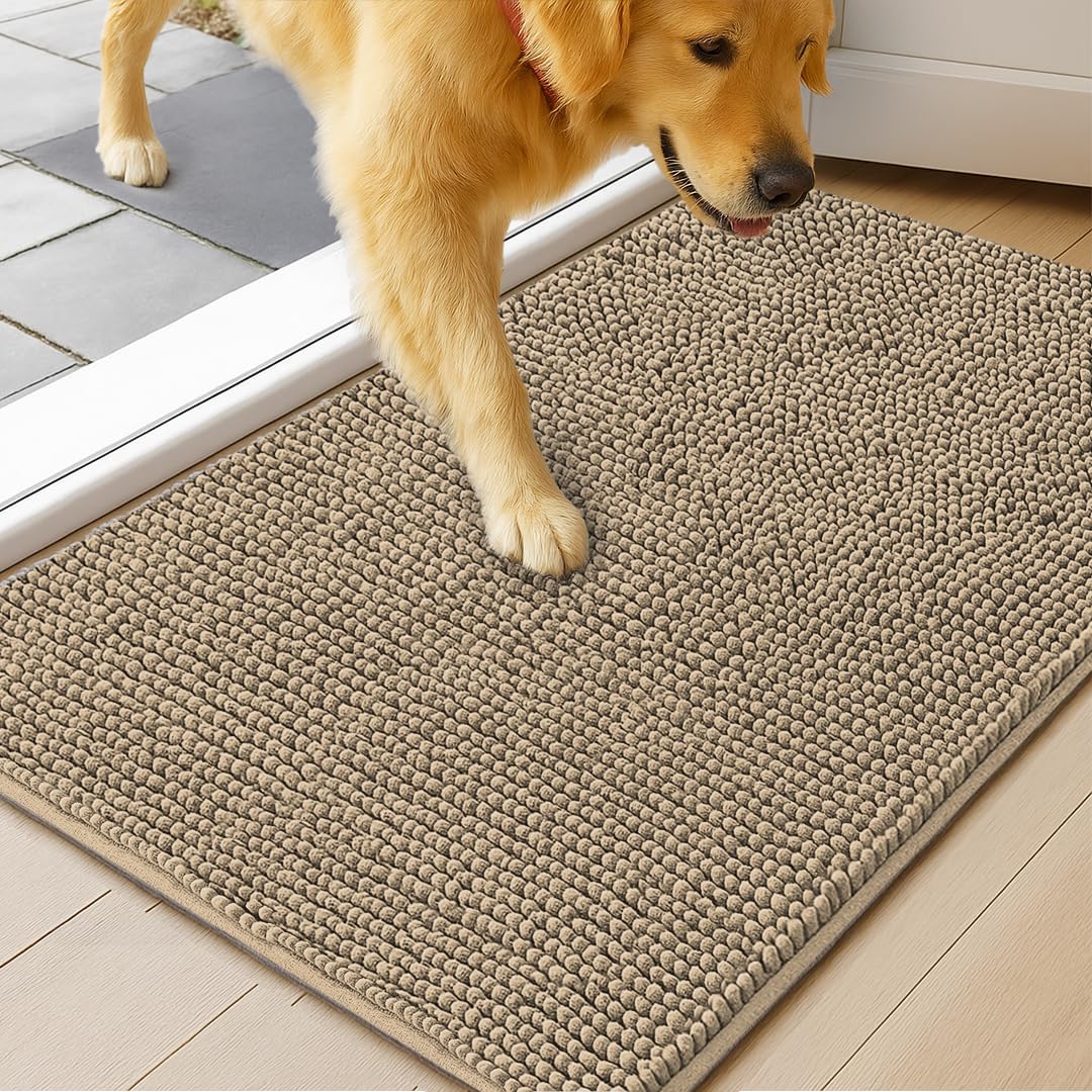 MUDGUARD MAT at doorway trapping mud and moisture to protect floors.