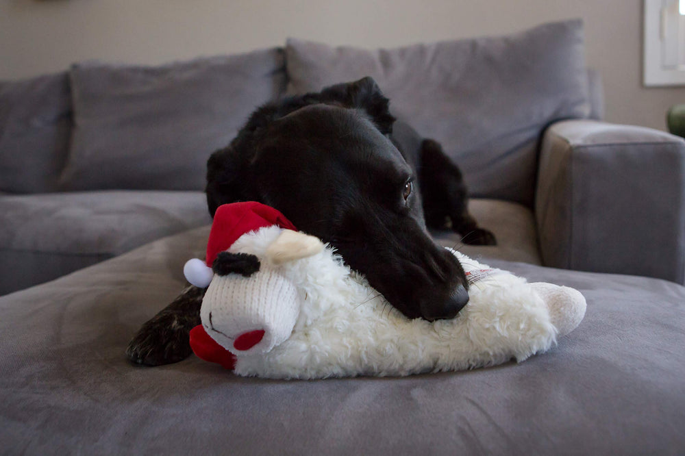 Multipet dog standing holiday lamb chop santa hat side angle, soft cuddly toy for holiday play