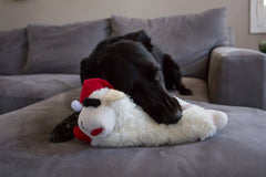 Multipet dog standing holiday lamb chop santa hat side angle, soft cuddly toy for holiday play
