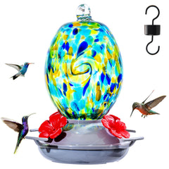 Muse Garden starry-night glass hummingbird feeder enhances outdoor decor and attracts pollinators.