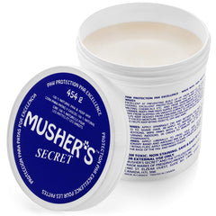 Musher's Secret dog paw wax jar protects paws with all-natural ingredients for outdoor adventures.