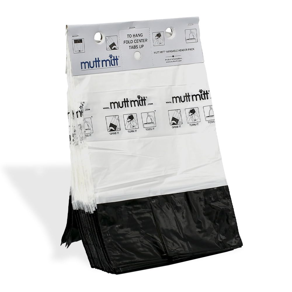 Mutt Mitt station header bags mounted, ready for quick refills during busy dog walks.