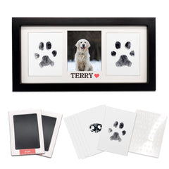 MYPAWLETS paw print frame displays a cherished memory in a stylish wall display.