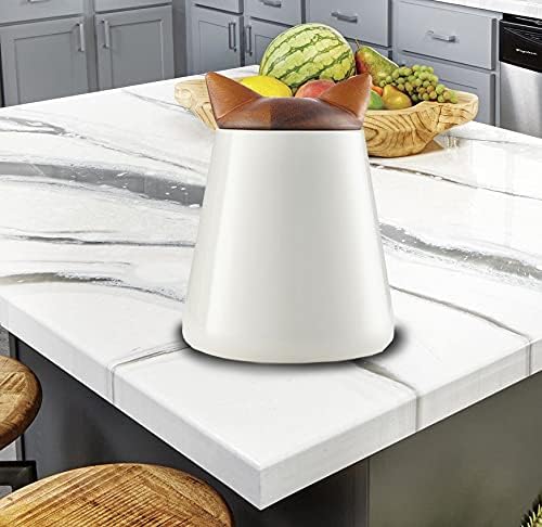 Nambe cat treat jar doubles as a stylish countertop accent.