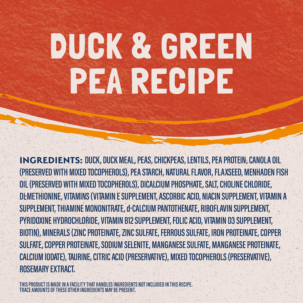 Natural Balance green-pea-fiber kibble closeup highlights grain-free fiber for digestive support.