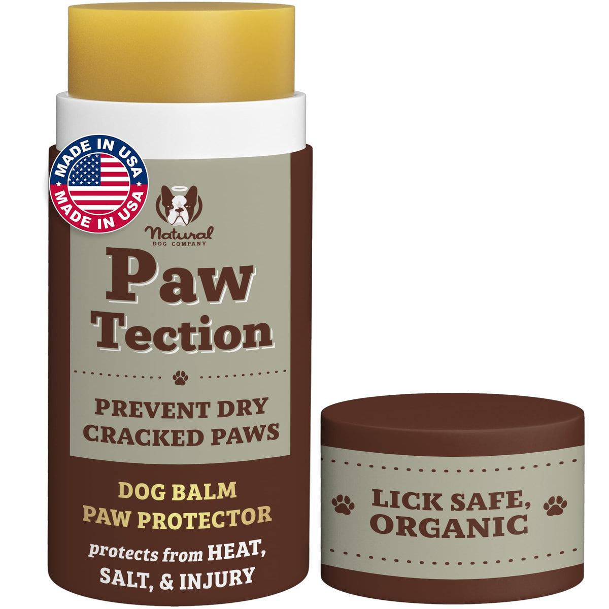 Natural Dog Company PawTection Balm stick applied to a paw for quick protection.