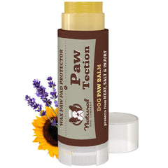 Natural Dog Company PawTection Balm stick close-up for protective paw care.