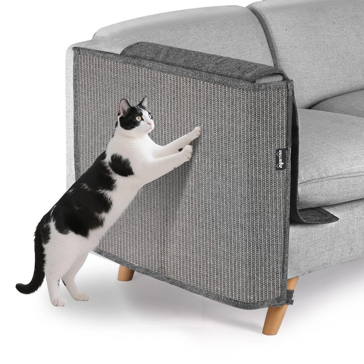 NATUYA cat scratch protector on sofa corner (right) guards upholstery from claws.