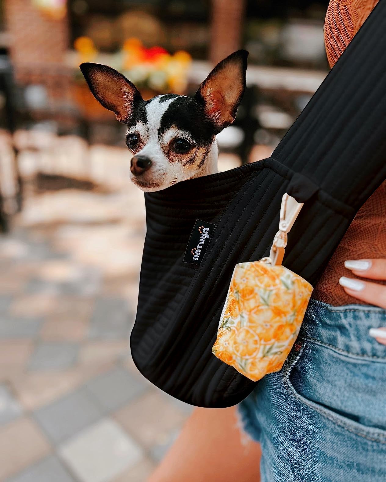 NATUYA small dog carrier sling shows wide comfortable shoulder strap for even weight distribution