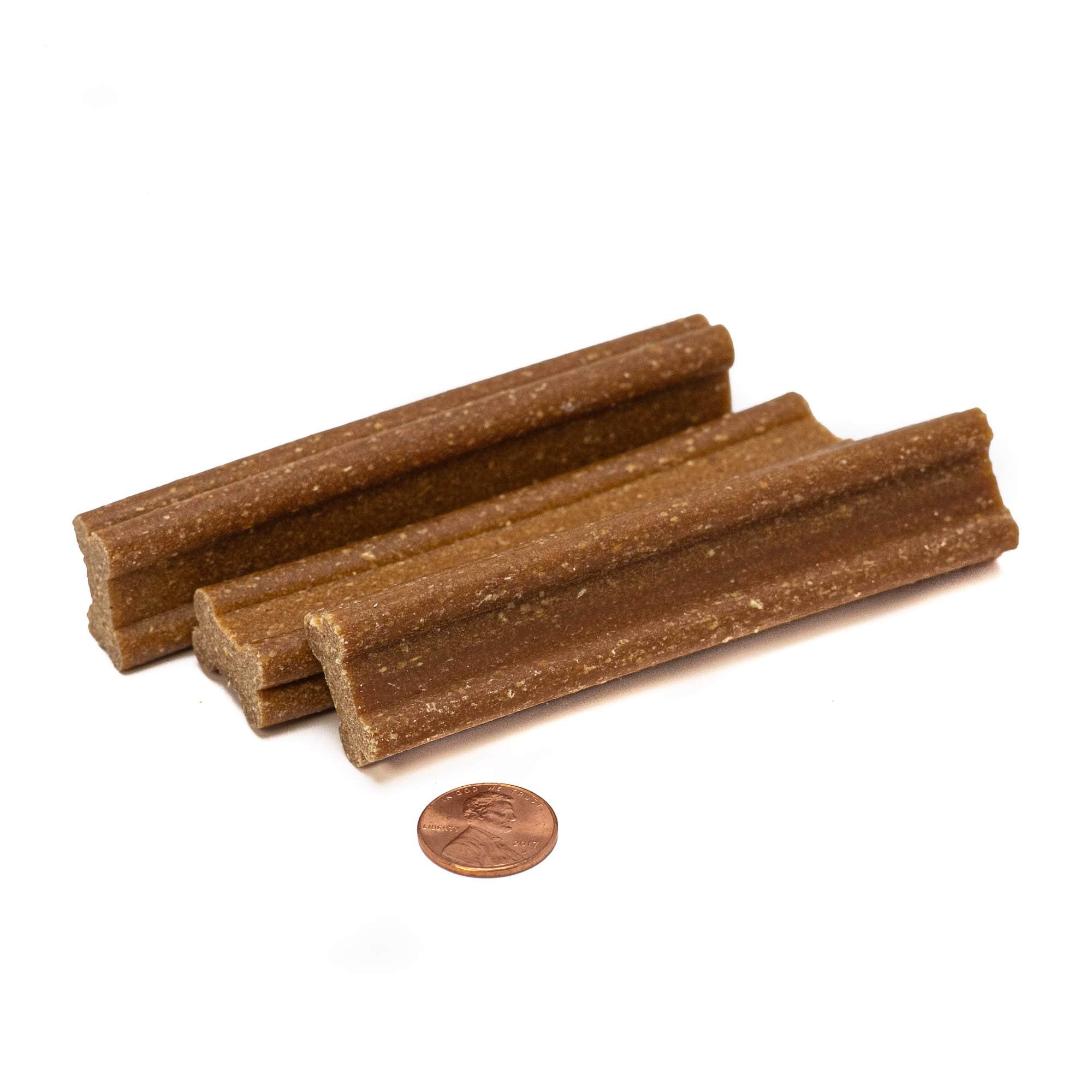 Naughty Spotty Doctor Spotty Dog Dental Chews dog enjoying chew, ideal as a reward.