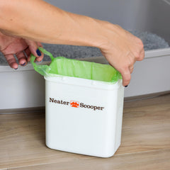 Neater Pets green tie-handle bags for quick, hygienic trash sealing.