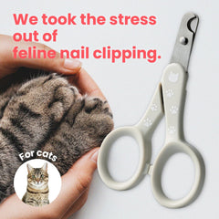 NECOICHI Purrcision gray grip in hand showing comfortable control during grooming.