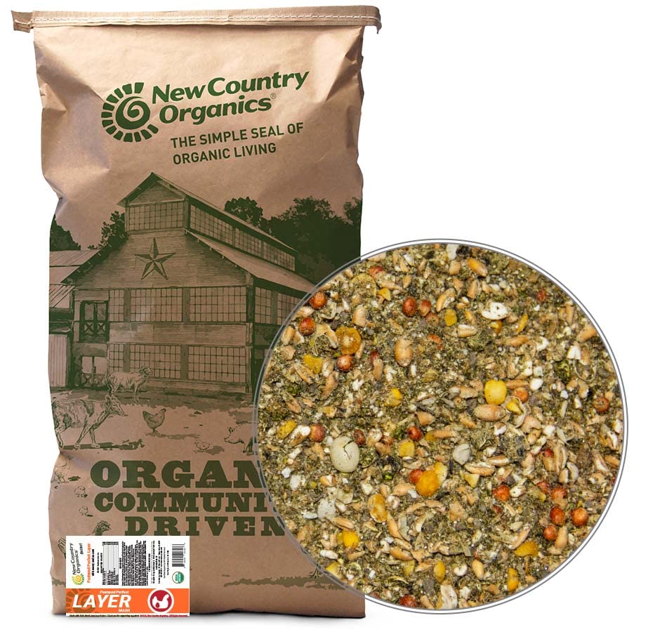 New Country Organics layer feed bag shows corn-free, soy-free nutrition.