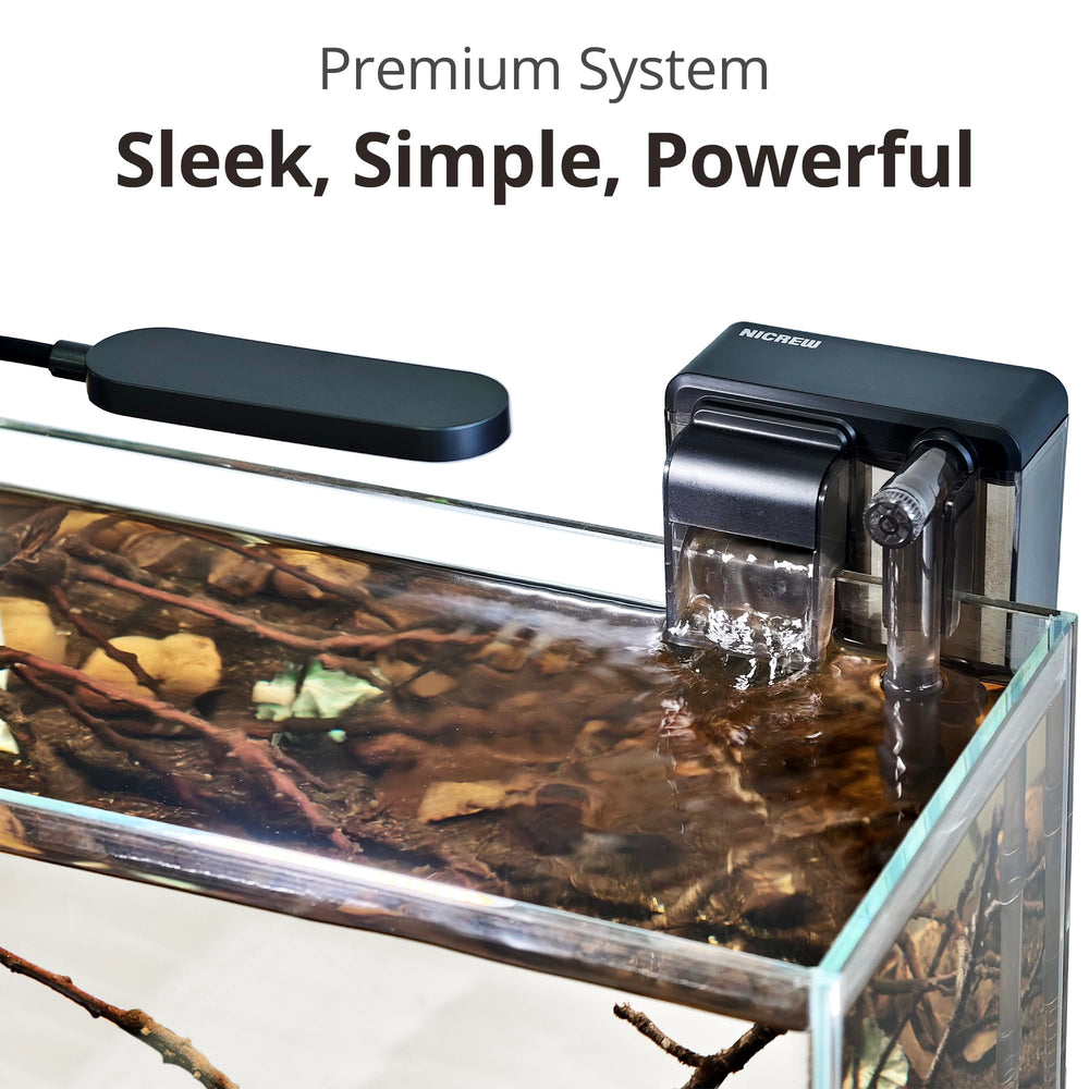 NICREW nano aquarium with integrated light shows vibrant colors and plants thriving.
