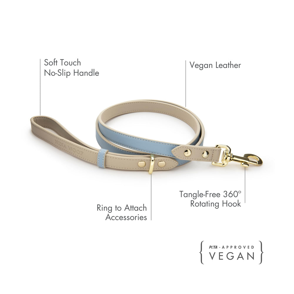 Nina Woof blue leash showing reinforced hardware for durability during daily outings.