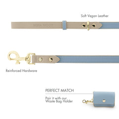 Nina Woof European-design blue leash with gold accents elevates urban strolls.