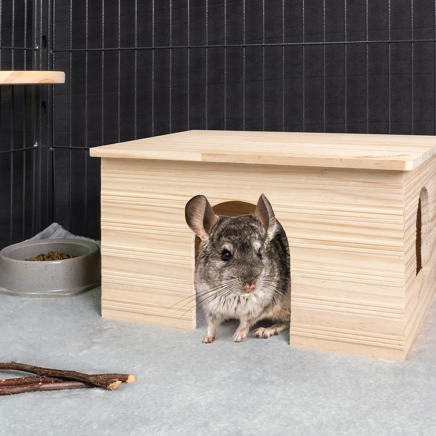 Niteangel Wood House dimensions label communicates large space in compact footprint.