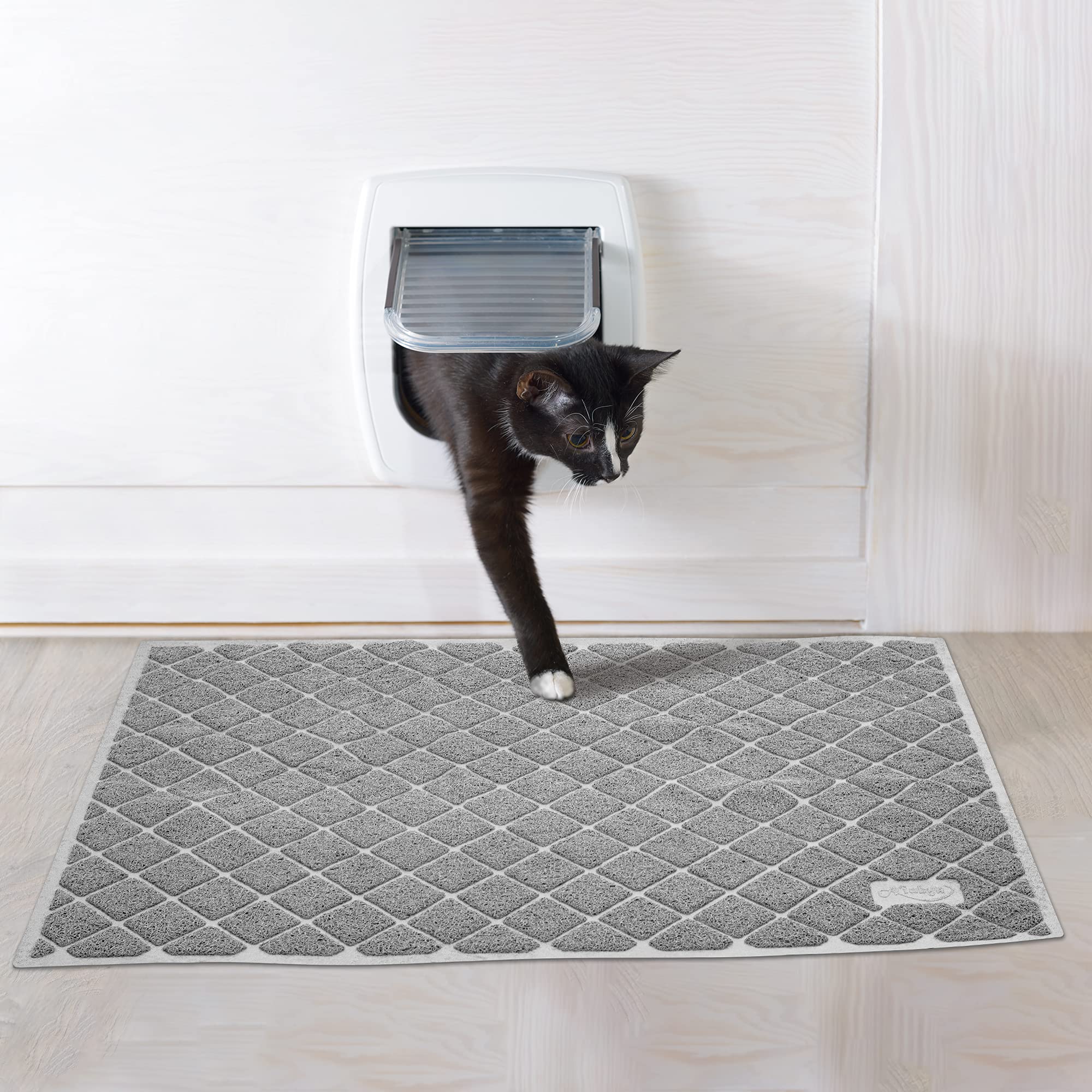 Niubya Premium Cat Litter Mat 35 x 23 inches offers generous coverage.