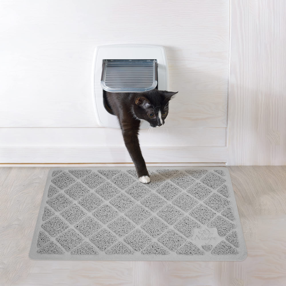 Niubya Premium Cat Litter Mat traps litter before it escapes the box