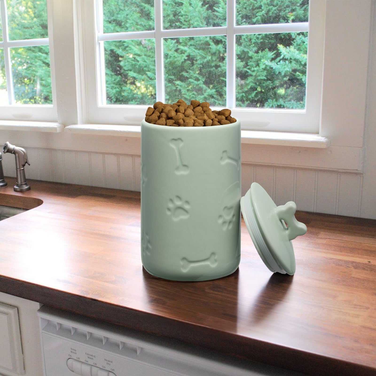 NIXBYO dishwasher-safe dog treat jar for quick cleaning after meals.