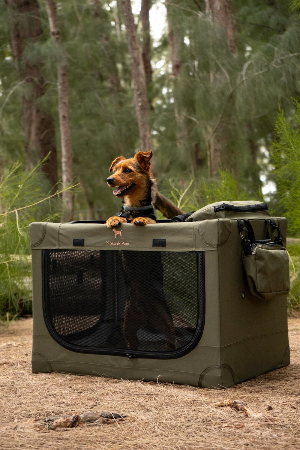 Noah & Paw collapsible dog crate storage pockets keep essentials handy.