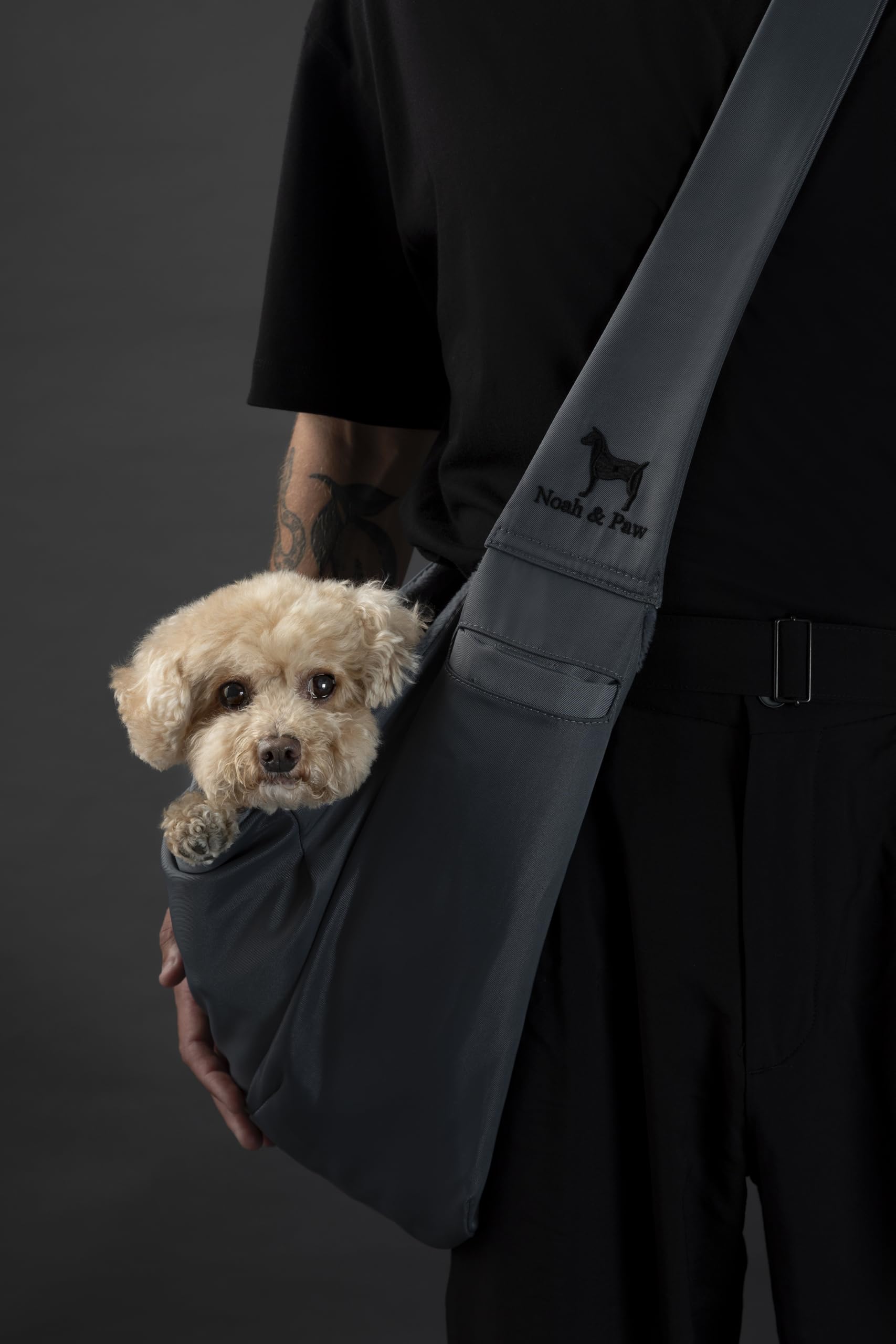 NOAH & PAW adjustable shoulder strap on dog sling enables easy length changes.